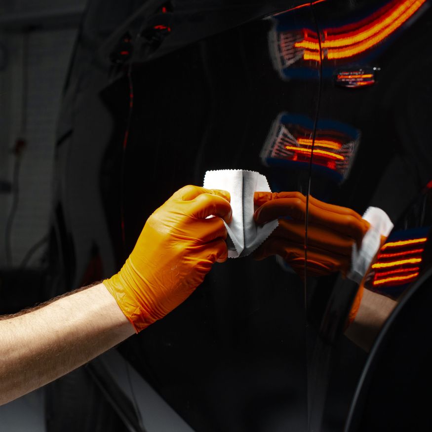 car-polish-wax-worker-hands-polishing-car-buffing-polishing-vehicle-with-ceramic-car-detailing-man-holds-polisher-hand-polishes-car-with-nano-ceramic-tools-polishing Car polish wax worker hands polishing car. Buffing and polishing vehicle with ceramic. Car detailing. Man holds a polisher in the hand and polishes the car with nano ceramic. Tools for polishing